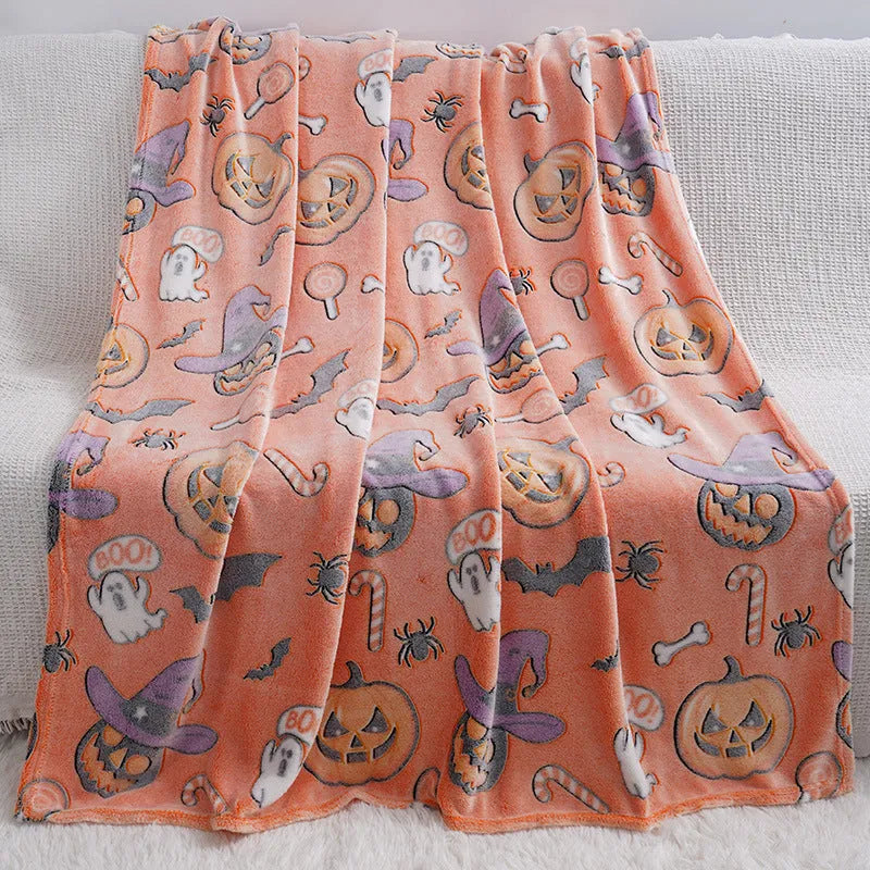 A soft flannel children's blanket with a cartoon pattern, shown in one of five available colours.