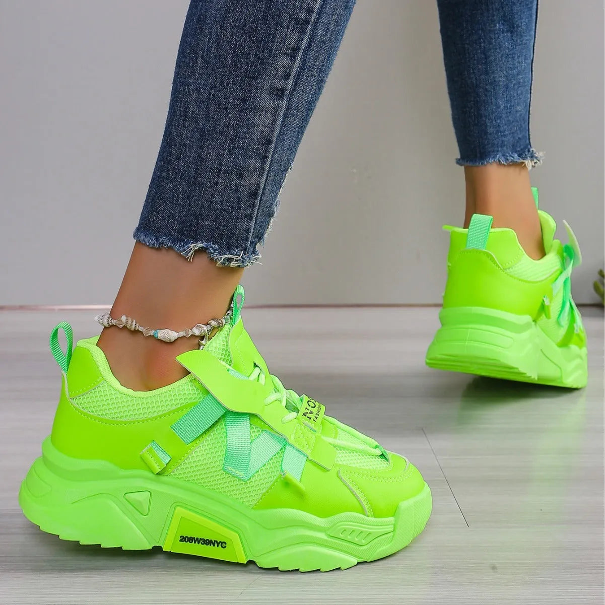 Women's platform mesh sports shoes in purple, green, white, pink and yellow colours with front lace-up design