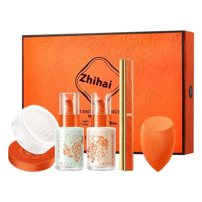 Five piece light fog makeup set with isolating milk, liquid foundation, small tube lipstick and loose powder in ivory and natural
