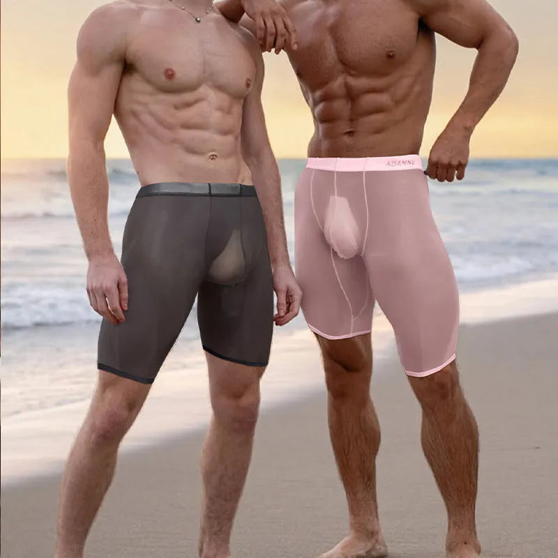 Men's black mesh seamless shorts with hip lift design on a solid colour background