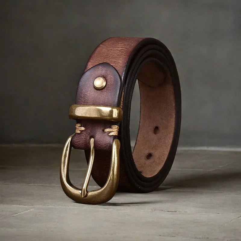 Men's black genuine cowhide leather belt with a copper pin buckle on a white background.