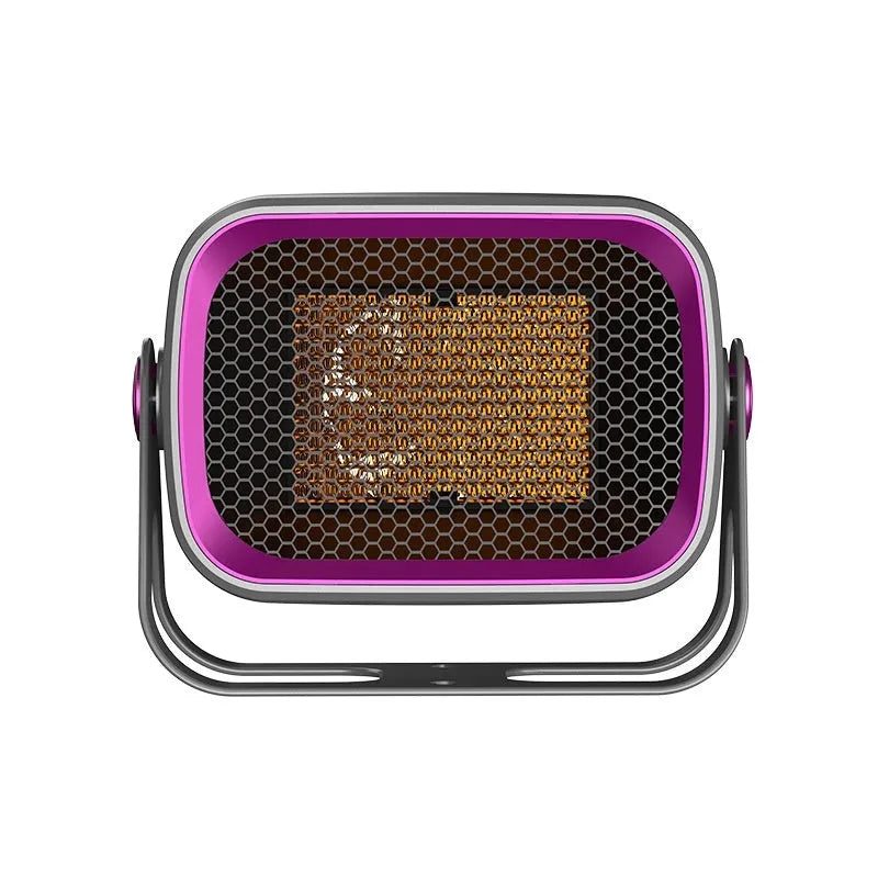 Grey compact desktop ceramic electric heater with rotatable body on a wooden desk.