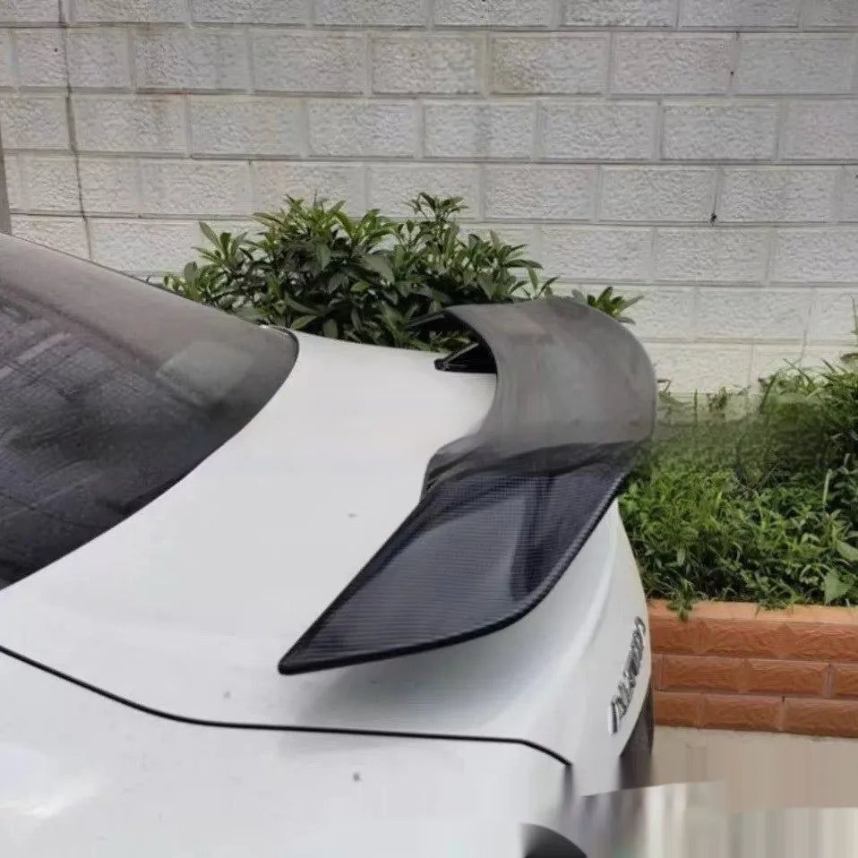 Universal punch-free ABS car spoiler shown in carbon pattern finish