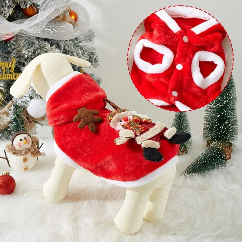 Small dog wearing a Christmas flannel hoodie in Red Santa Claus pattern standing on grass