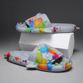 Open toe home slippers with shark design in soft EVA material, shown in multiple colour options.