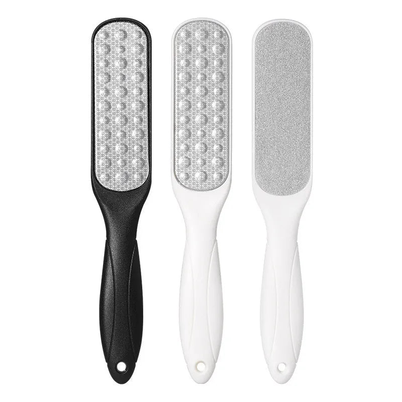 Stainless steel double-sided foot grinder with removable sandpaper foot gear.