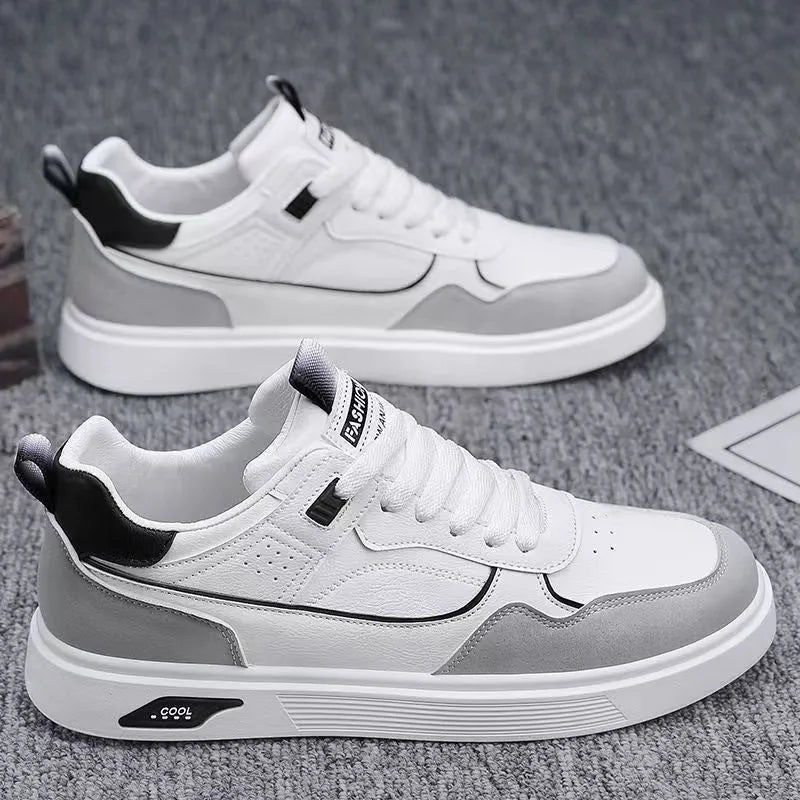Men's low-top canvas board shoes in black, beige, or grey with leather stitching details.