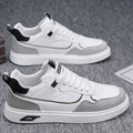 Men's low-top canvas board shoes in black, beige, or grey with leather stitching details.