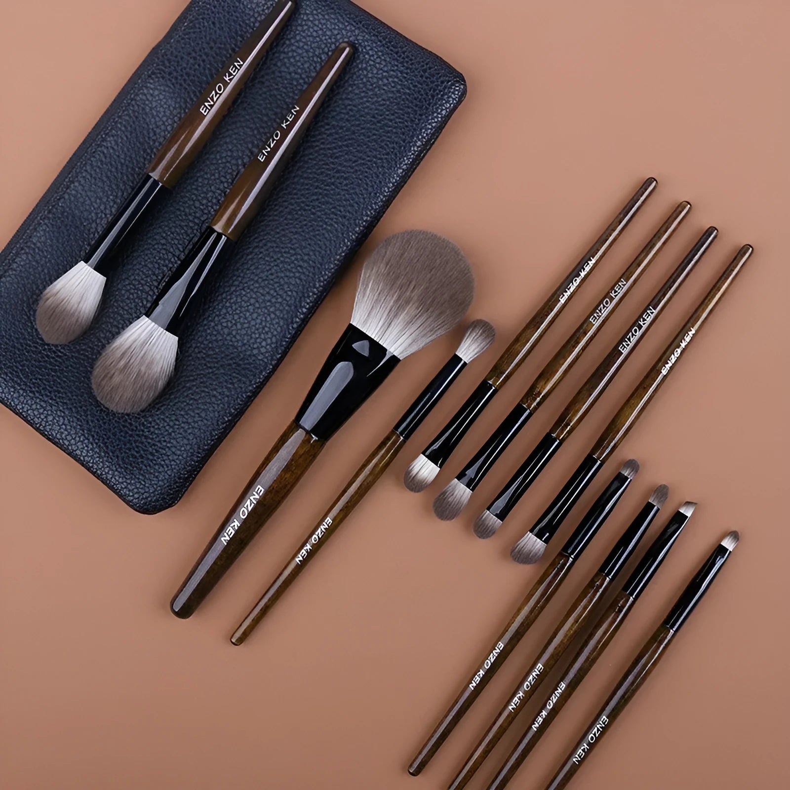 12-piece makeup brush set with wooden handles and a black PU storage bag.