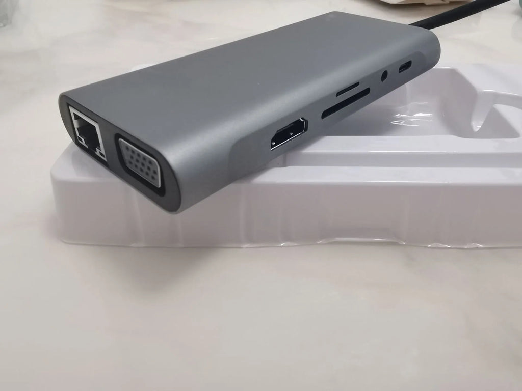 11-in-1 USB-C hub docking station with HDMI, VGA, audio, RJ45, USB 3.0, SD, TF, and PD ports