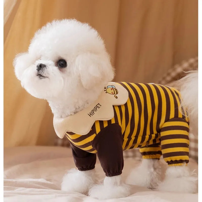 Yellow bee-patterned dog pajamas on small dog, four-legged full coverage suit with lapel collar