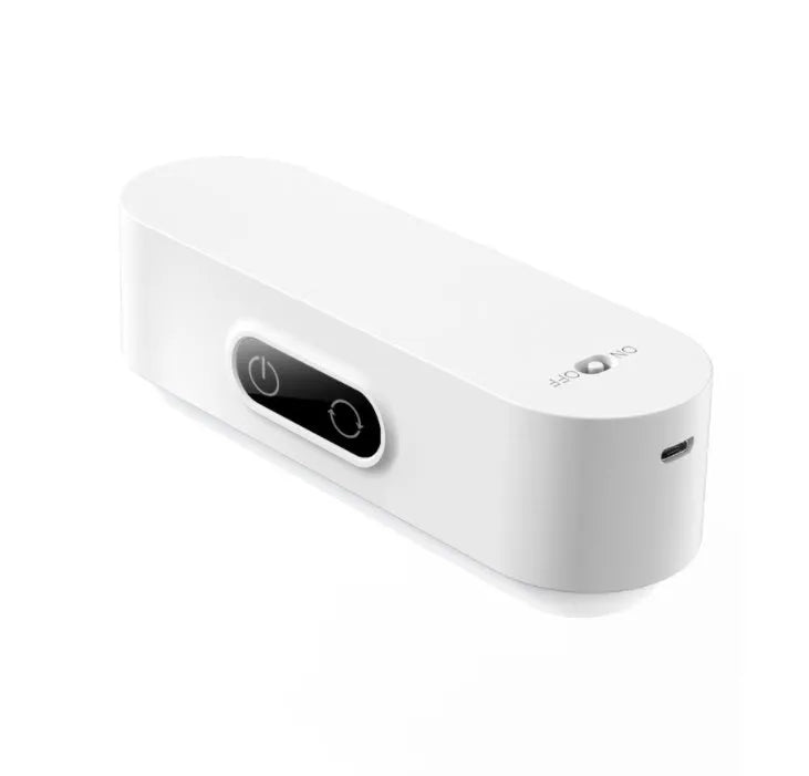 White magnetic USB rechargeable LED night light with touch controls and a curved light surface.