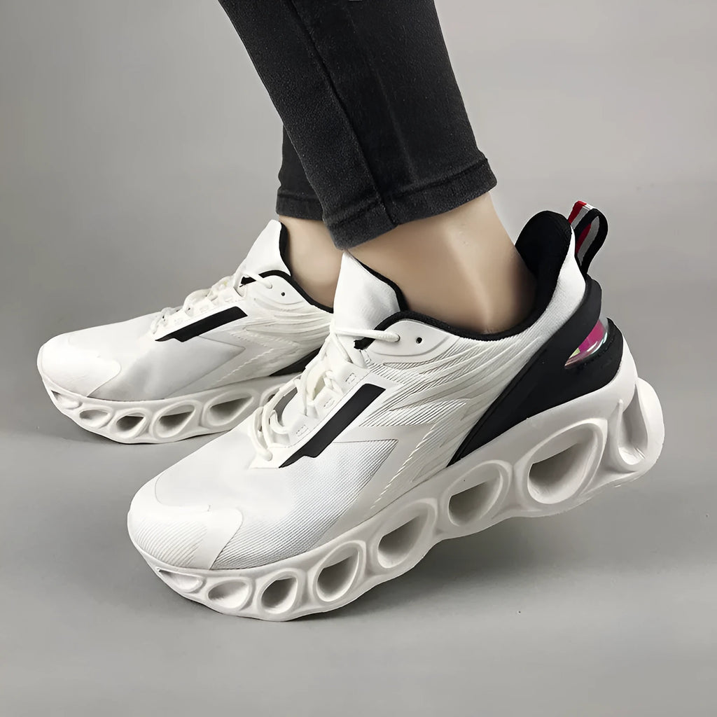 Men's low-top casual sports shoes in mesh with lace-up front and EVA sole, shown in black colour.