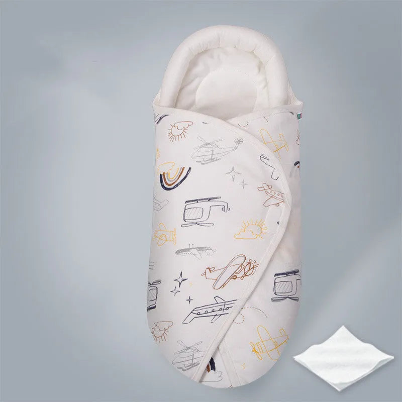 Cotton anti-startle swaddle blanket for babies in a colourful dinosaur print, 30 by 60 cm.