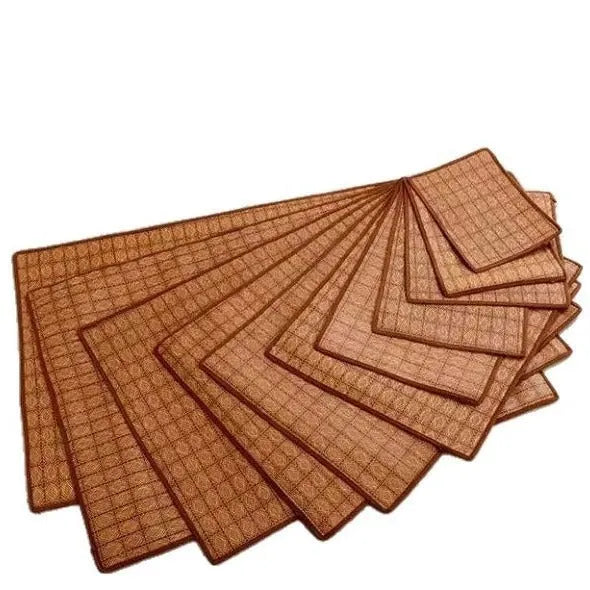 Brown rattan fibre summer cooling mat for dogs on a wooden floor.