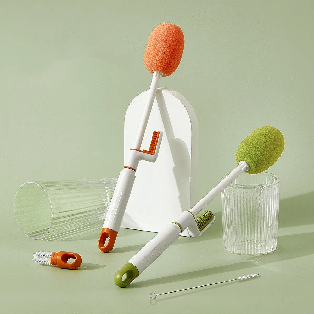Long handle plastic cup brush in orange for cleaning tall bottles and cups