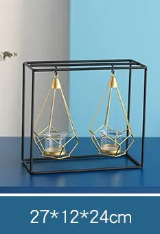 Set of six Nordic iron candle holders in various styles for block candles on a wooden shelf