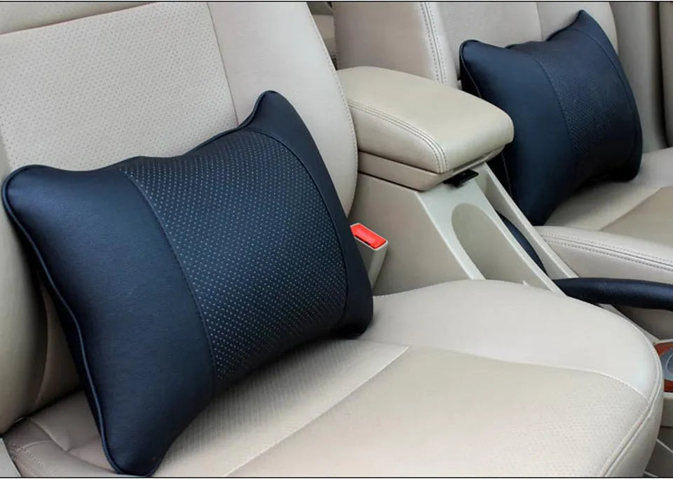 Breathable car headrest with leather cover, down yarn filling, and classic punched ventilation pattern