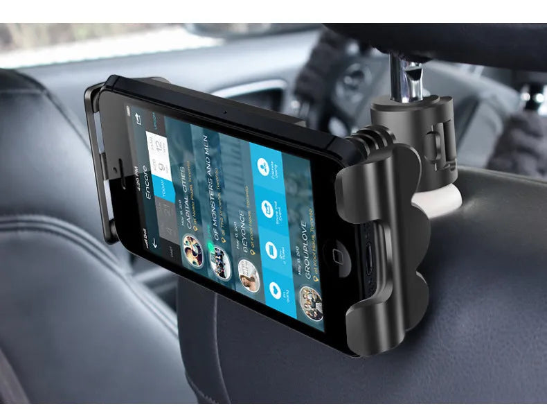 Black universal car headrest tablet holder mounted on a seat, showing 360-degree rotation and extended arm.
