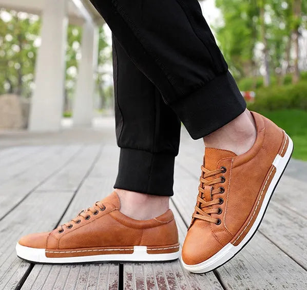 Handmade men casual shoes with rubber sole and front tie lace up in brown colour on display