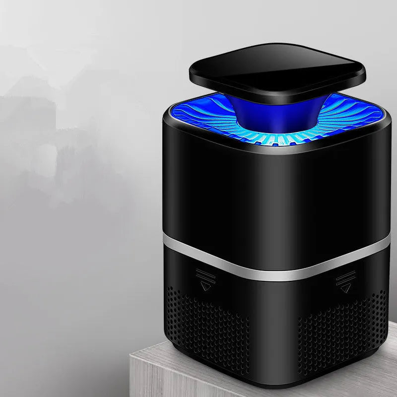 Photocatalyst mosquito killer in white or black with USB cable, blue light attraction and physical trapping, over 150 square metres coverage.