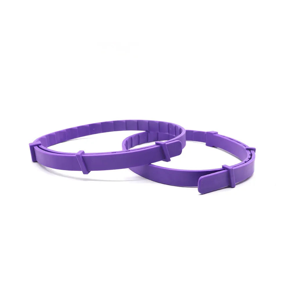 Four dog anxiety relief collars in different colours with Chinese style monochrome design