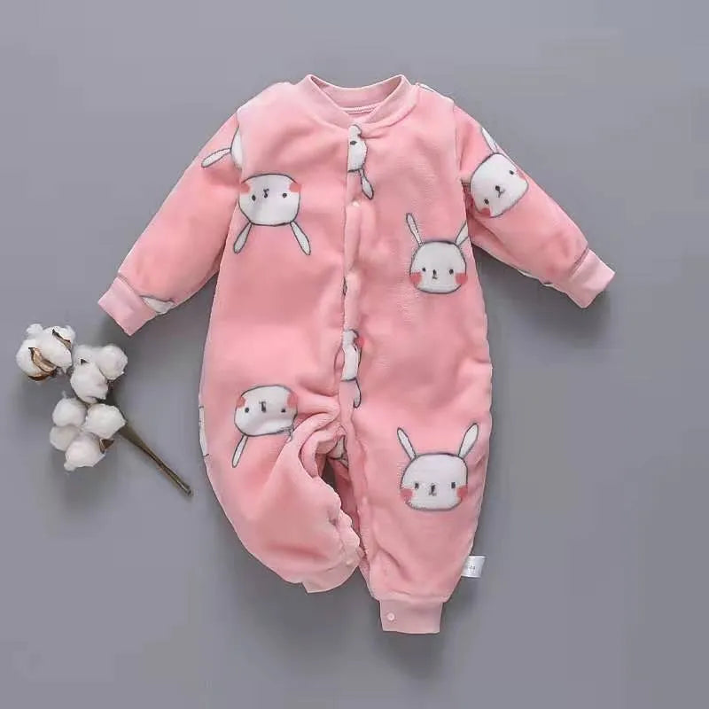 Baby wearing long sleeve flannel romper with animal print design