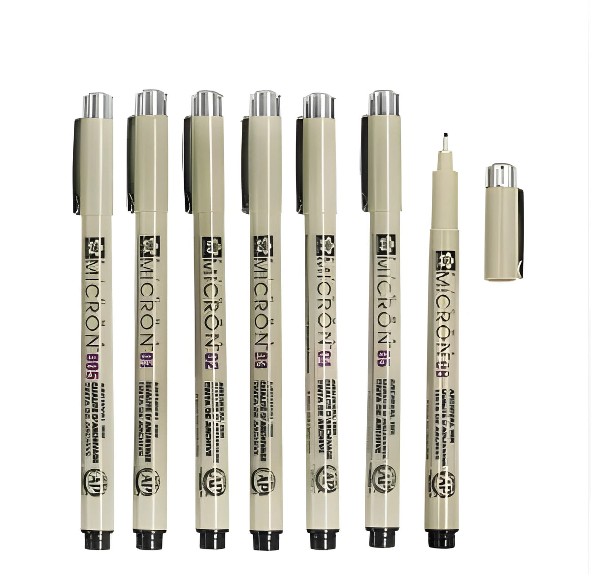 Pack of 7 Sakura Pigma Micron pens in assorted nib sizes from 0.2mm to 0.5mm with a 0.5mm pencil on white background