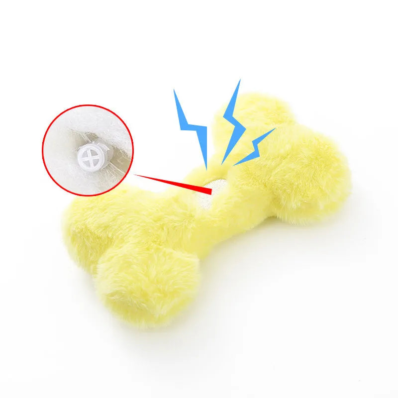 Blue bone-shaped plush dog toy with squeaker for interactive play and chewing.