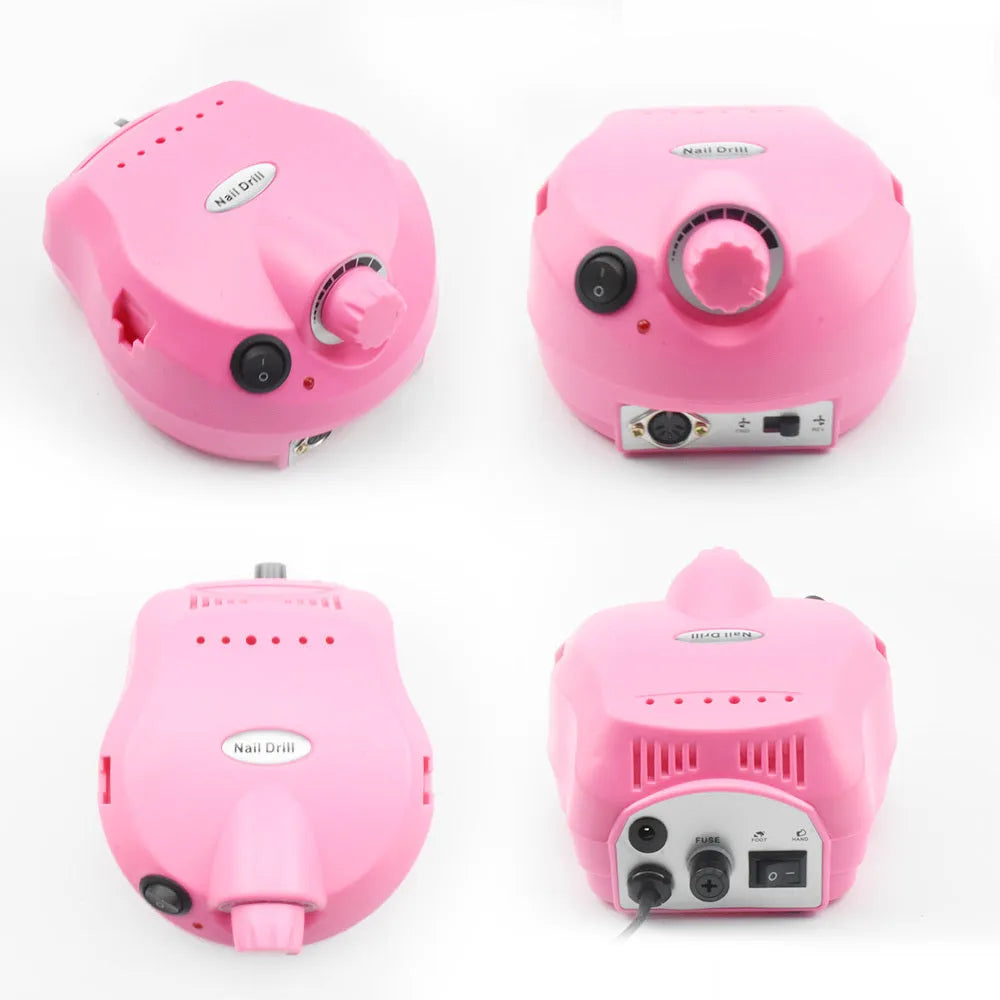 Nail 202 sander in pink with handpiece, foot switch, and grinding heads on a white background
