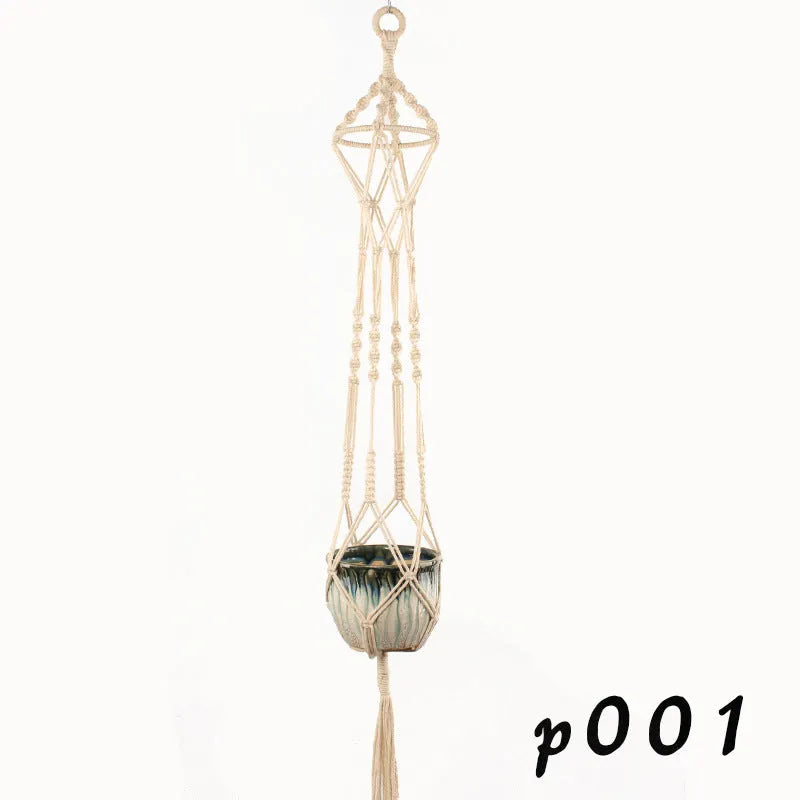 A rustic woven wire plant basket made from cotton rope, holding a green potted plant.