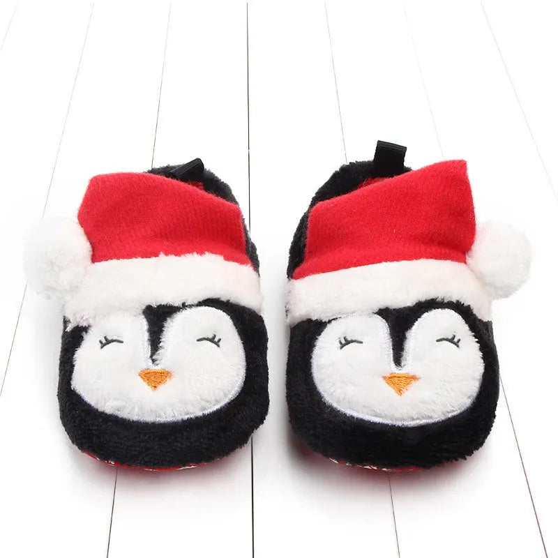 Toddler coral fleece shoes with non-slip sole in Christmas penguin design, low tube sleeve style