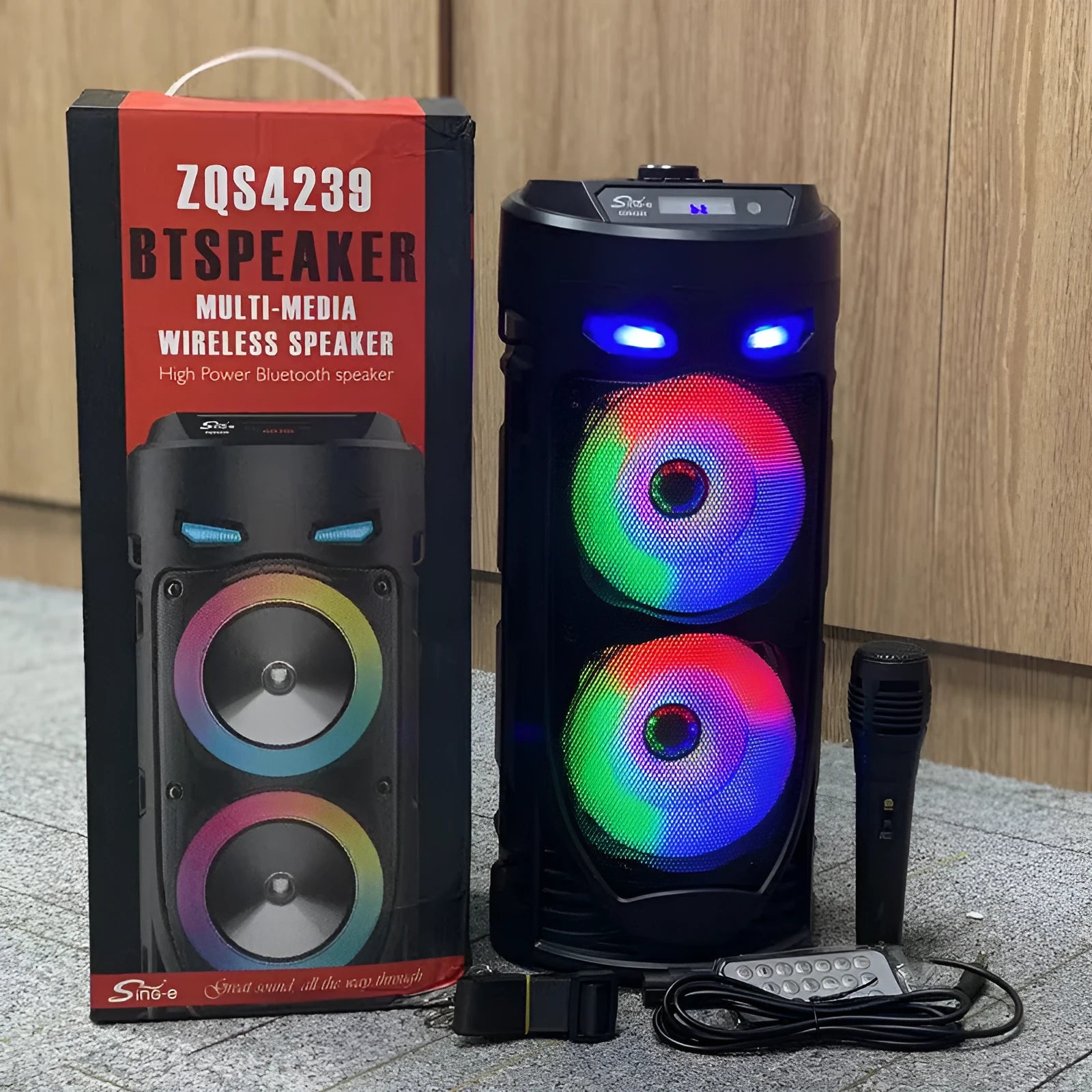 Black portable Bluetooth speaker with wheat pattern finish and dual horn cannon design
