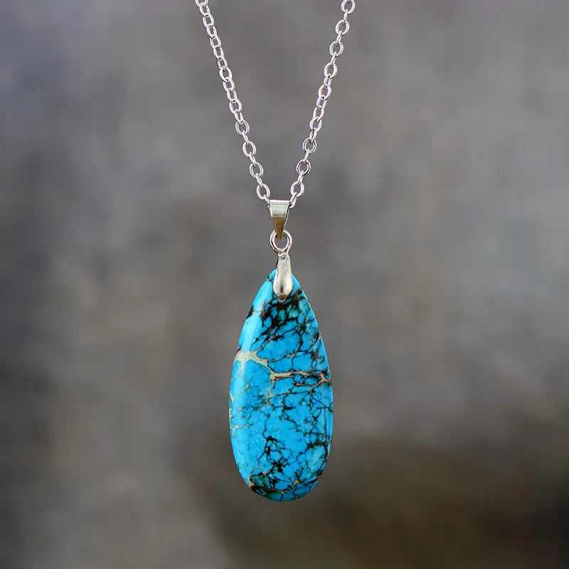Jade water drop pendant on an 18K gold plated chain, showing hongjin colour finish.