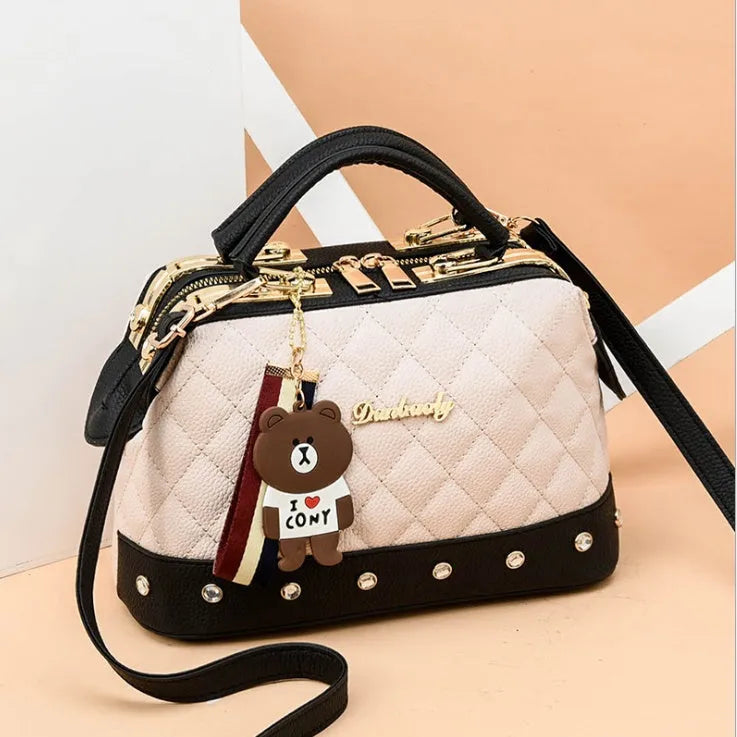Women's PU leather square shoulder bag with zipper closure in black, small size