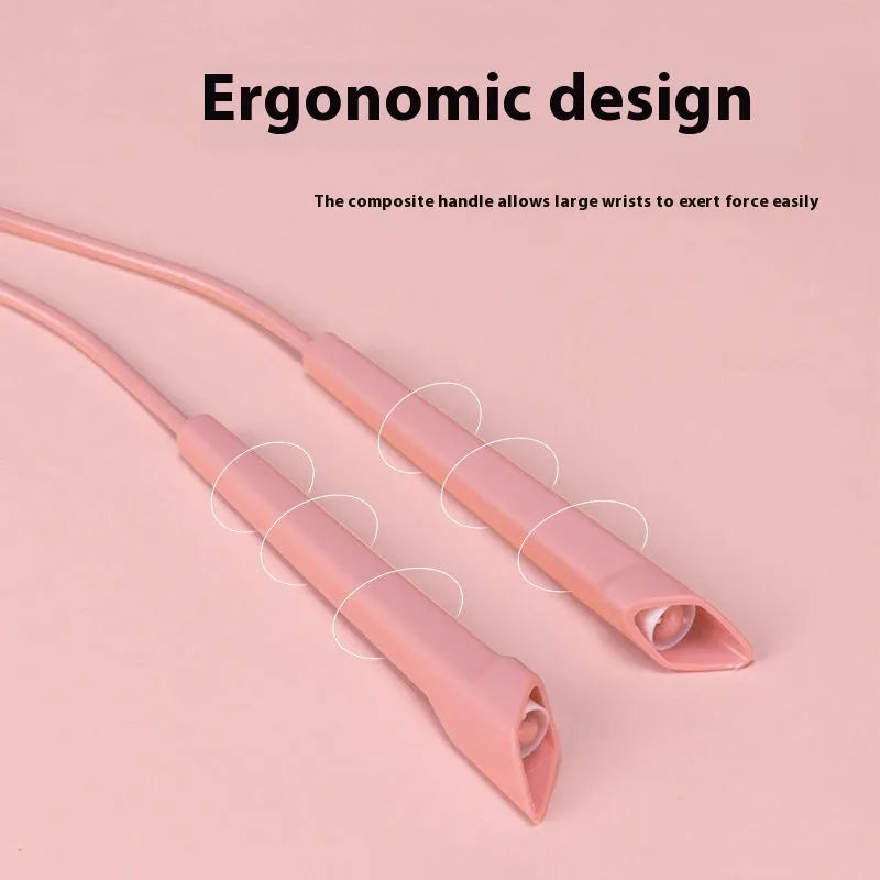 A fitness skipping rope with blue plastic handles and a coiled PVC rope on a grey background.