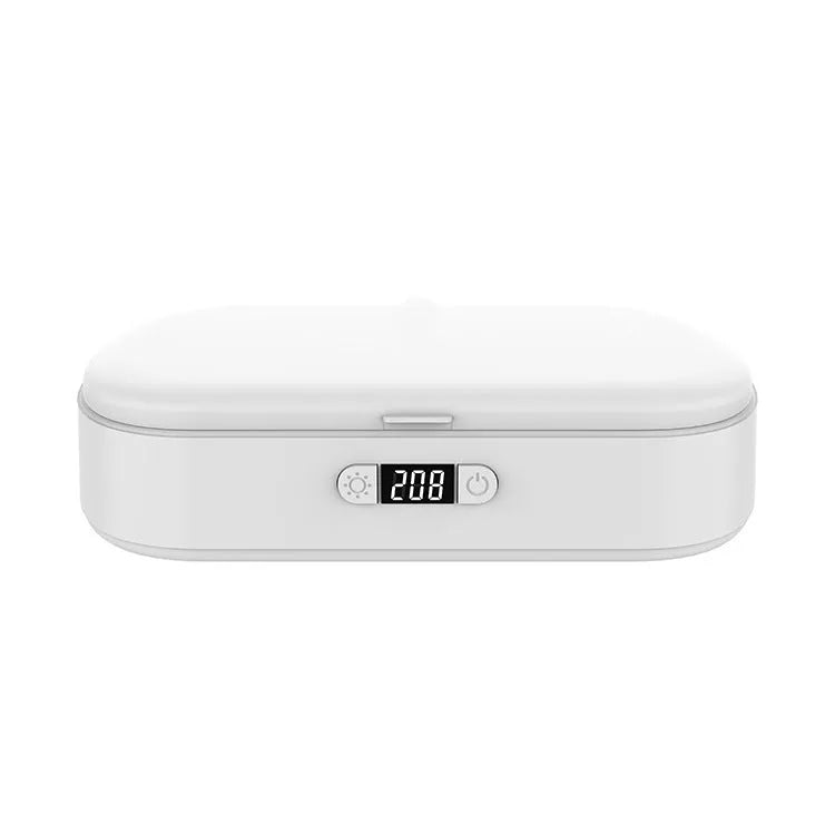 White ABS plastic wireless UV steriliser box with phone inside, showing charging indicator.