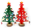 Hand-painted red wooden Christmas tree decoration approximately 36cm tall on a desktop