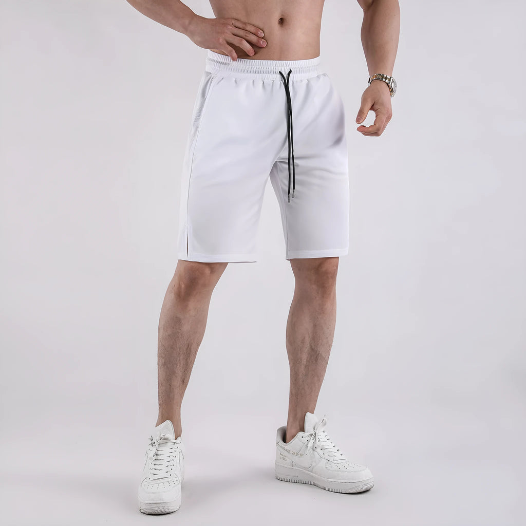 Men's black quick-drying mesh shorts in a loose capri length with elastic waistband.