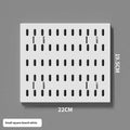 White punch-free wall board with wire-wrap loops holding cables and keys