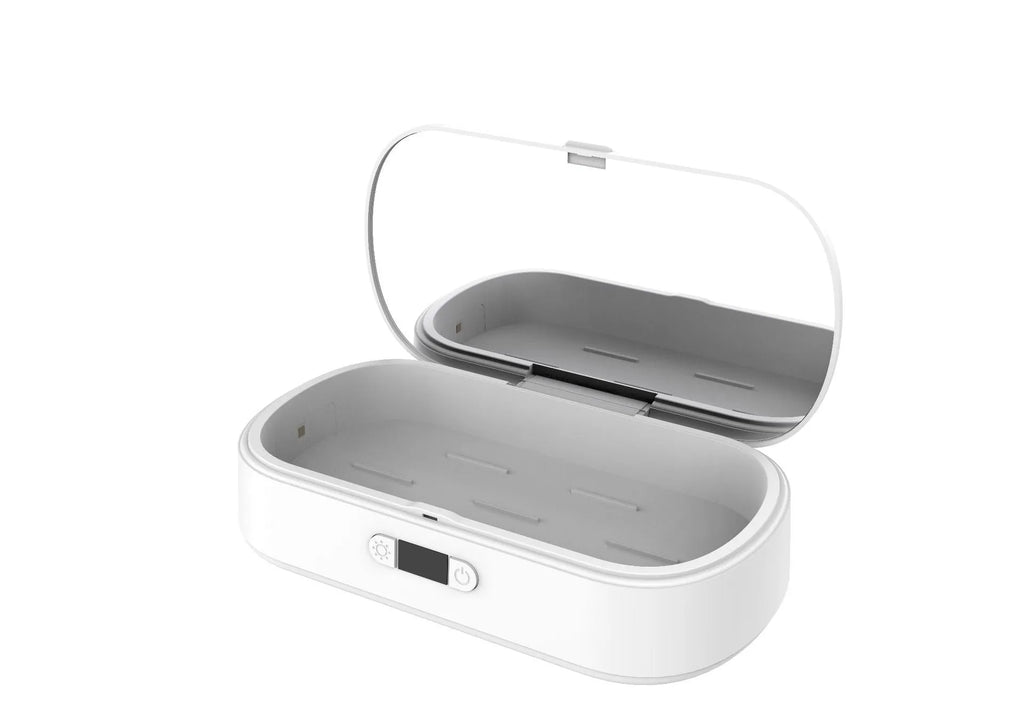 White ABS plastic wireless UV steriliser box with phone inside, showing charging indicator.
