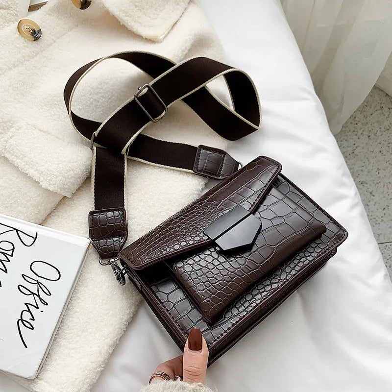 Vintage-style crossbody bag in PU material showing black, brown, khaki and red colour options