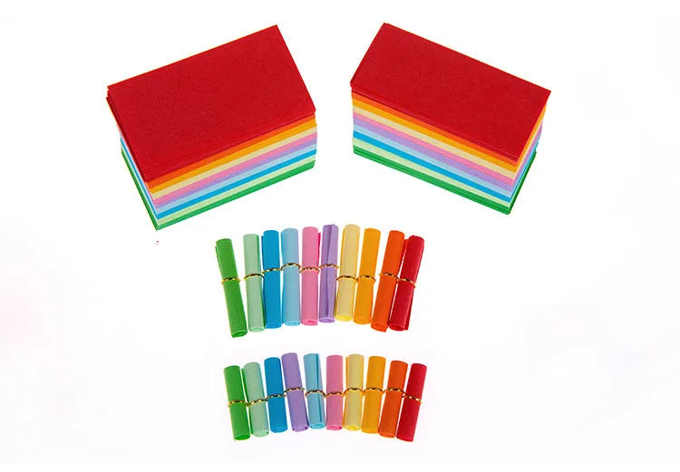 Colourful mini paper scrolls with eyelets in multiple sizes for drift bottle messages