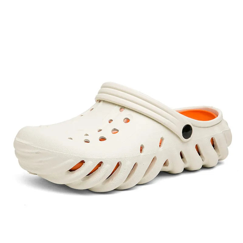 Men's beige EVA sandals with hollow-out design and non-slip sole on a wooden deck.