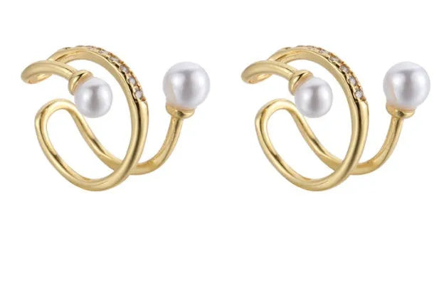 Silver plated pearl ear clips for unpierced ears, shown as a gold or silver pair in Japanese Korean style.