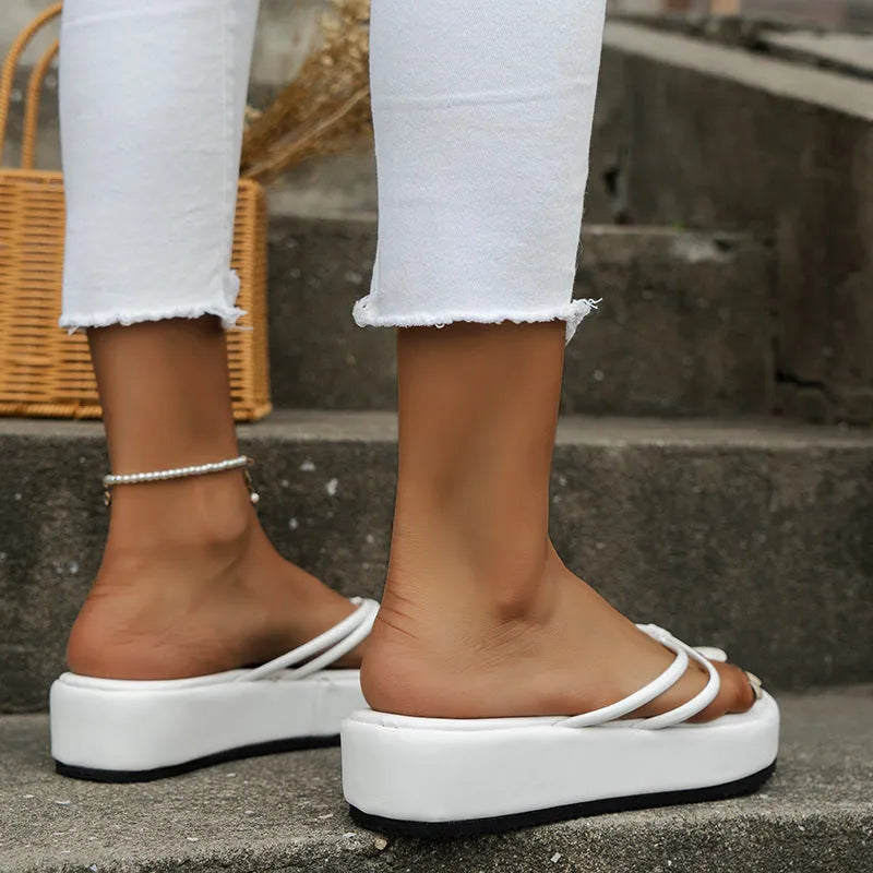 Thick sole herringbone pattern flip-flops in multiple colours showing round toe design