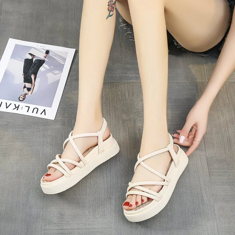 Women's Roman style platform sandals in black with round toe and TPR sole