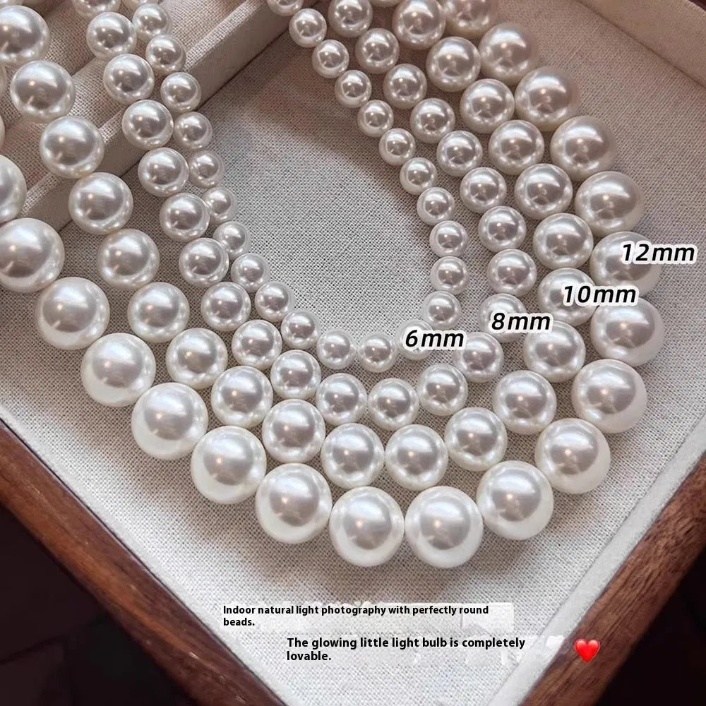 925 silver ingot buckle necklace with Australian white shell pearls on a model, unisex clavicle chain style
