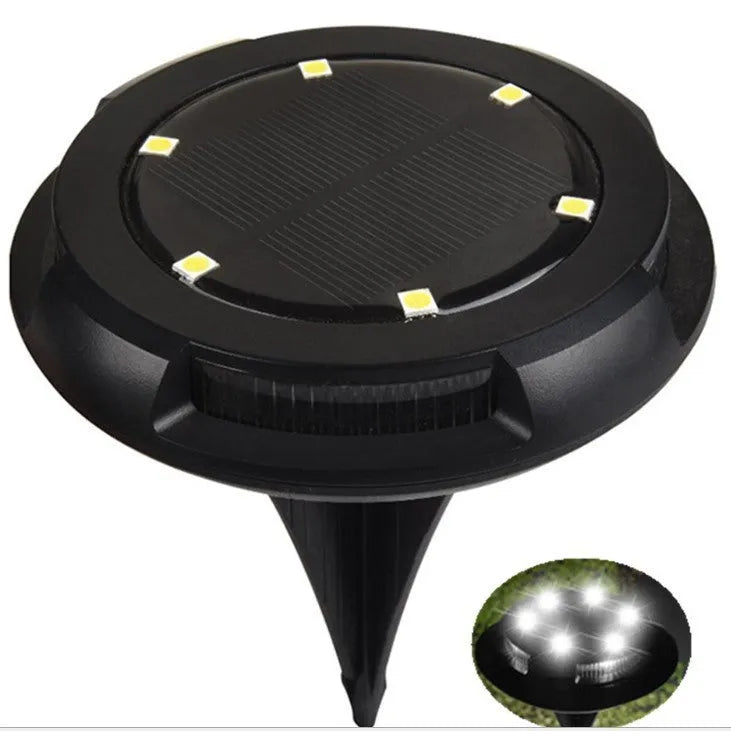 Black LED solar underground lawn light with seven colour cold white light, 11x4x13cm