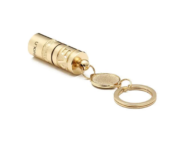Gold waterproof LED flashlight keychain with zinc alloy die-cast housing and polished finish